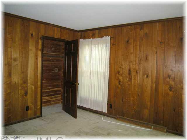 8307 Maloe Court Oak Ridge, NC 27310 - Photo 8 of 8 3rd Bedroom. 3rd Bedroom with cedar closet