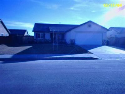 11793 Lupin Road Adelanto, CA 92301 - Photo 1 of 1 a view of backyard with wooden fence