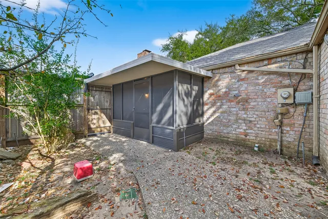 a backyard of a house with seating space