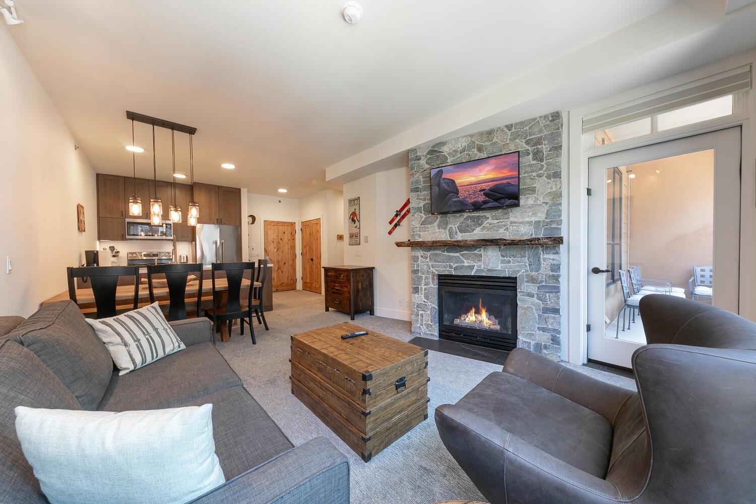 1750 Village East Road, Unit 5314 316 Olympic Valley, CA 96146 - Photo 1 of 28 a living room with furniture and a fireplace