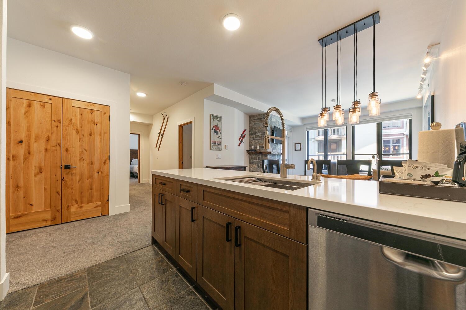 1750 Village East Road, Unit 5314 316 Olympic Valley, CA 96146 - Photo 11 of 28 a large kitchen with a large counter top a sink and cabinets