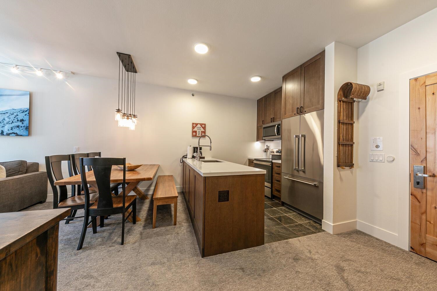 1750 Village East Road, Unit 5314 316 Olympic Valley, CA 96146 - Photo 12 of 28 a kitchen with refrigerator and furniture