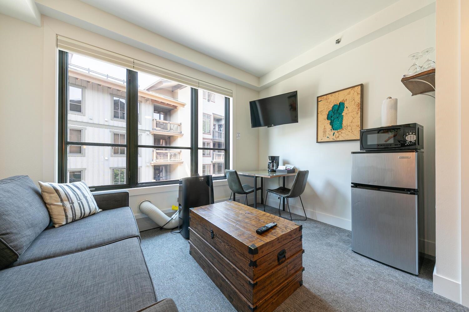 1750 Village East Road, Unit 5314 316 Olympic Valley, CA 96146 - Photo 21 of 28 a living room with furniture and a window