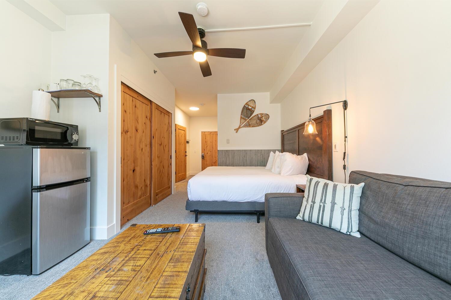 1750 Village East Road, Unit 5314 316 Olympic Valley, CA 96146 - Photo 22 of 28 a bedroom with a bed and a couch