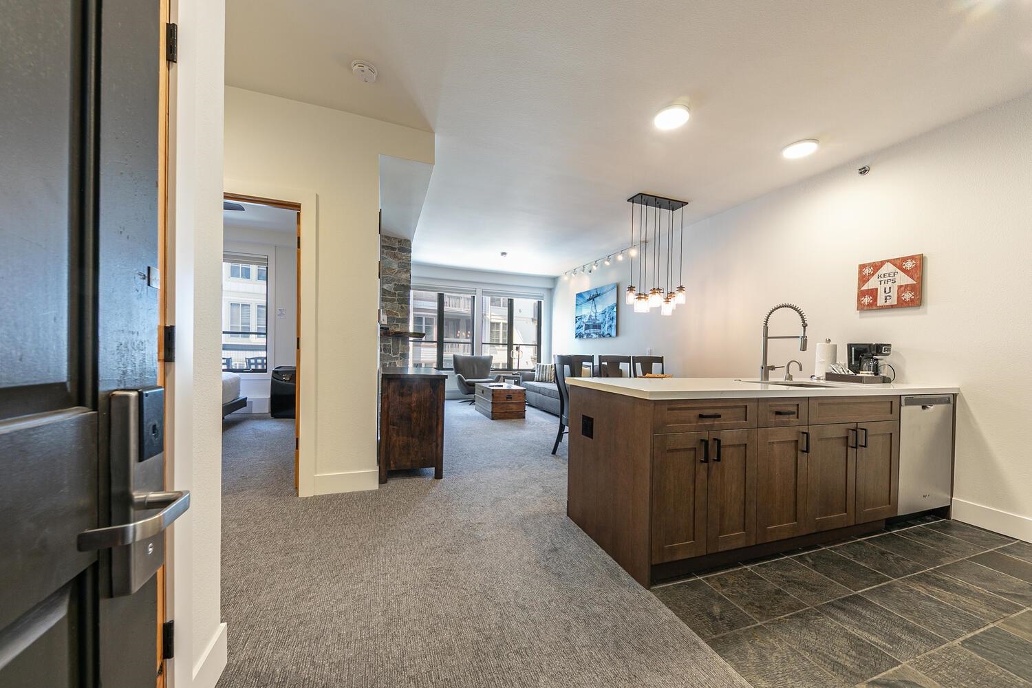 1750 Village East Road, Unit 5314 316 Olympic Valley, CA 96146 - Photo 24 of 28 a kitchen with stainless steel appliances granite countertop a refrigerator and a sink