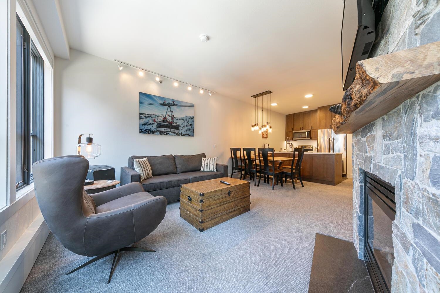 1750 Village East Road, Unit 5314 316 Olympic Valley, CA 96146 - Photo 3 of 28 a living room with furniture and a fireplace