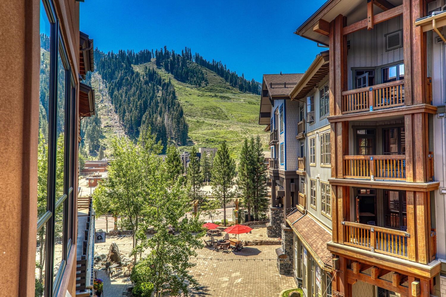 1750 Village East Road, Unit 5314 316 Olympic Valley, CA 96146 - Photo 4 of 28 a yellow building with trees in front of it