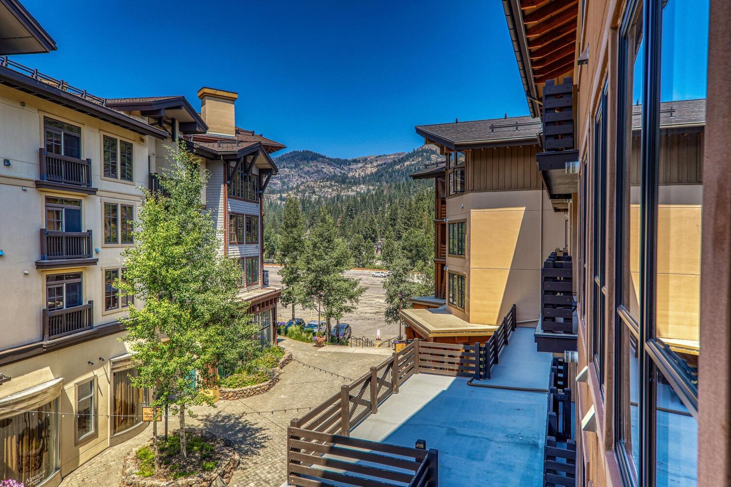 1750 Village East Road, Unit 5314 316 Olympic Valley, CA 96146 - Photo 5 of 28 a view of a balcony with chairs and wooden floor