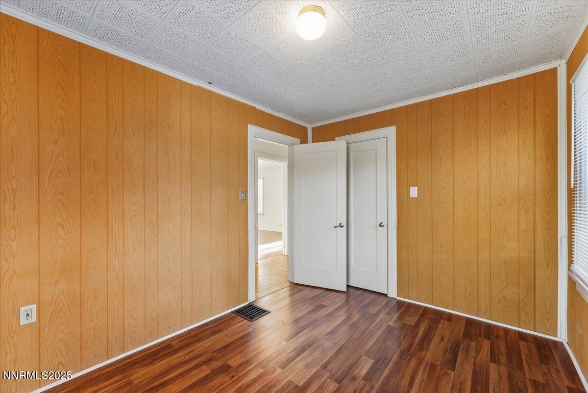 1140 The Strand Reno, NV 89503 - Photo 12 of 19 a view of an empty room with wooden floor