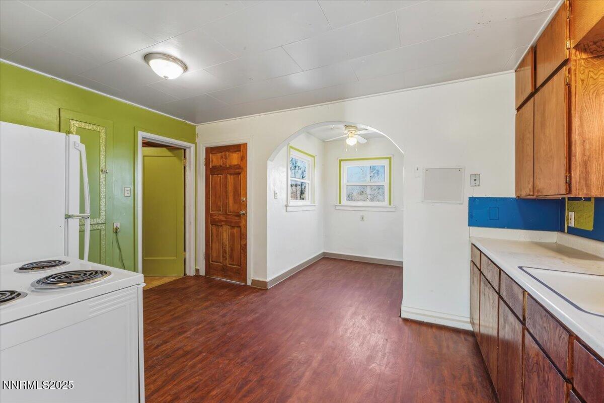 1140 The Strand Reno, NV 89503 - Photo 5 of 19 a view of hallway with wooden floor and cabinets