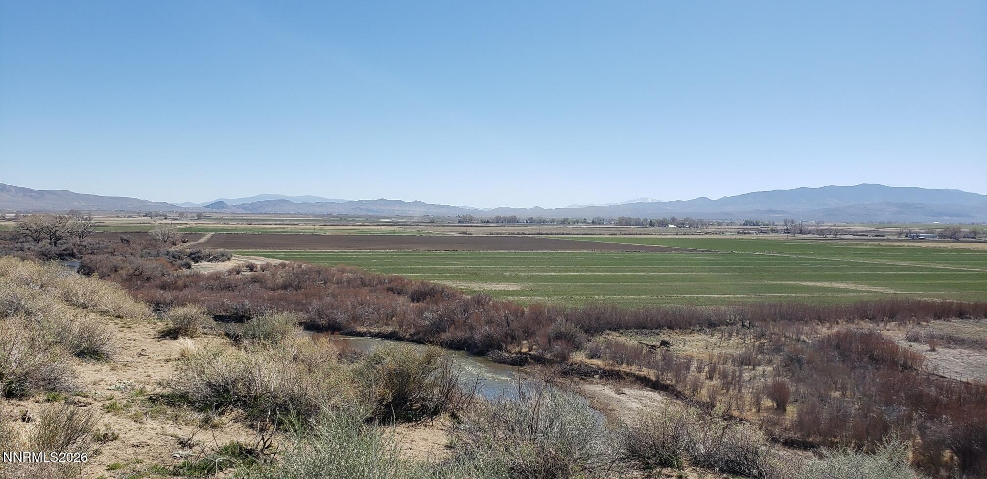 247 Artist View Road, Unit 6 Wellington, NV 89444 - Photo 1 of 4 a view of a lake with a mountain in the background