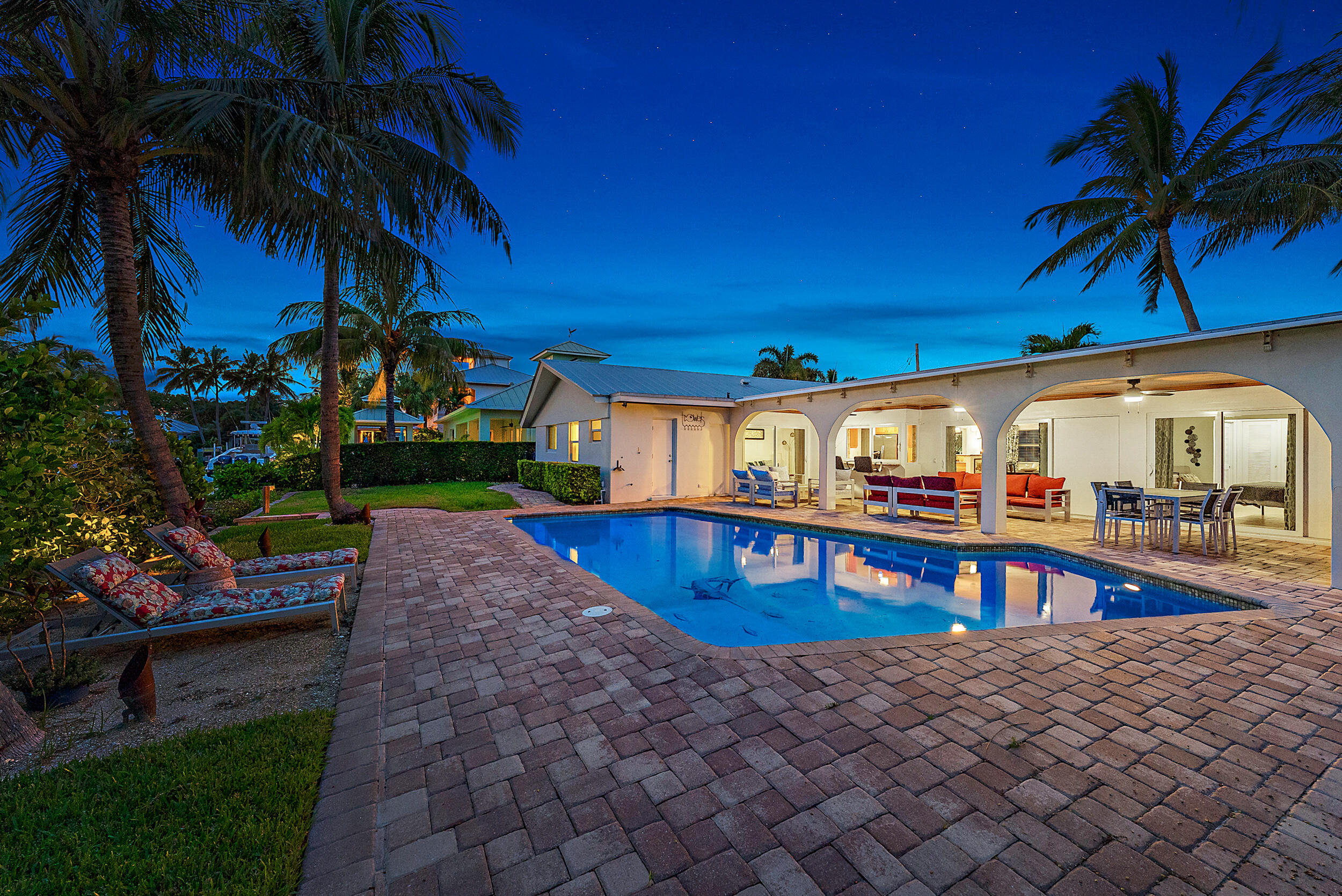 19165 Waterway Road Jupiter, FL 33469 - Photo 7 of 49 Exterior back Twilight