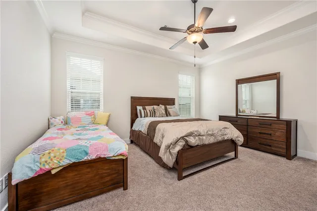 a bathroom with granite countertop a sink double vanity granite and a mirror