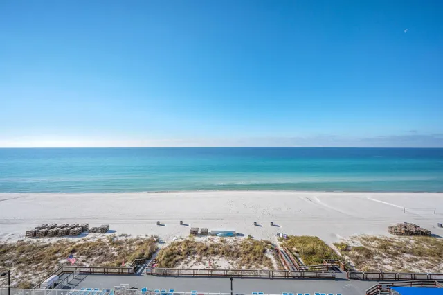 an aerial view of beach and ocean