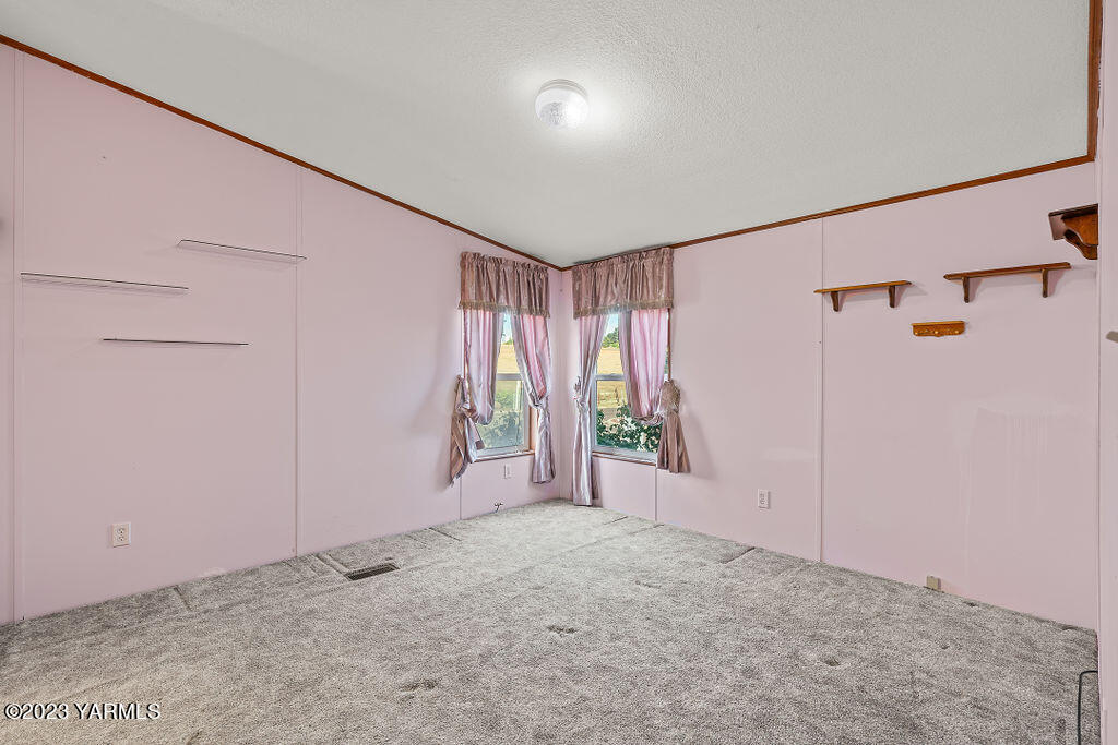 1200 South Euclid Road, Unit 99 Grandview, WA 98930 - Photo 12 of 22 a view of entryway with wooden floor