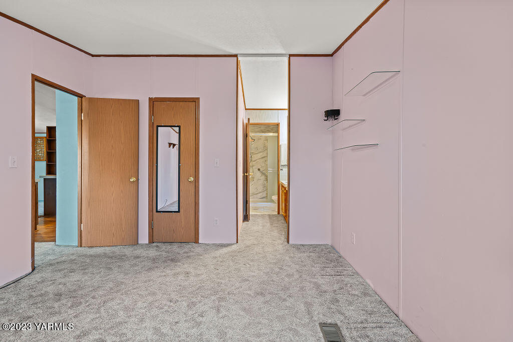 1200 South Euclid Road, Unit 99 Grandview, WA 98930 - Photo 13 of 22 a view of an empty room