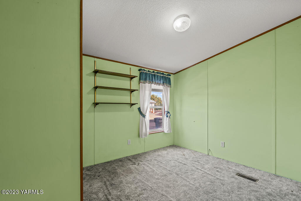 1200 South Euclid Road, Unit 99 Grandview, WA 98930 - Photo 18 of 22 a view of an empty room