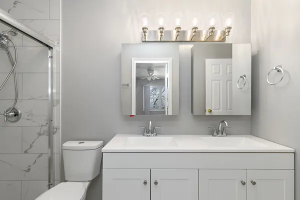 a bathroom with a sink and a toilet