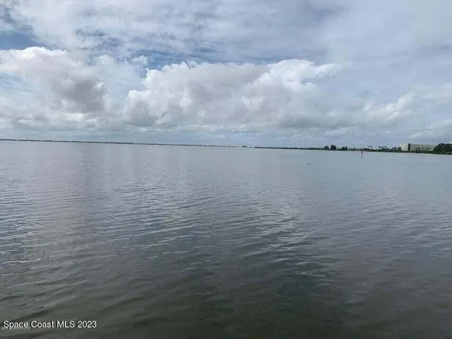 a view of a field with an outdoor space