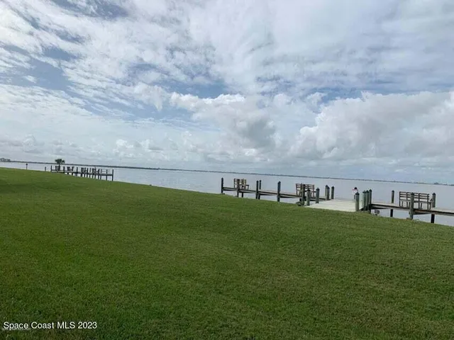 a front view of a building with garden