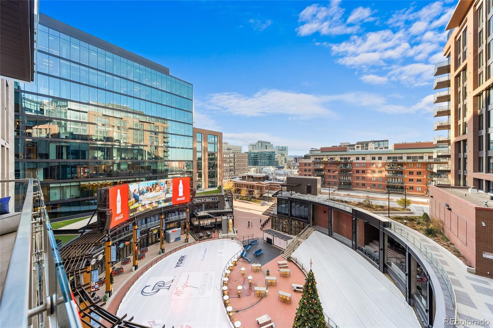 a view of a balcony with city view