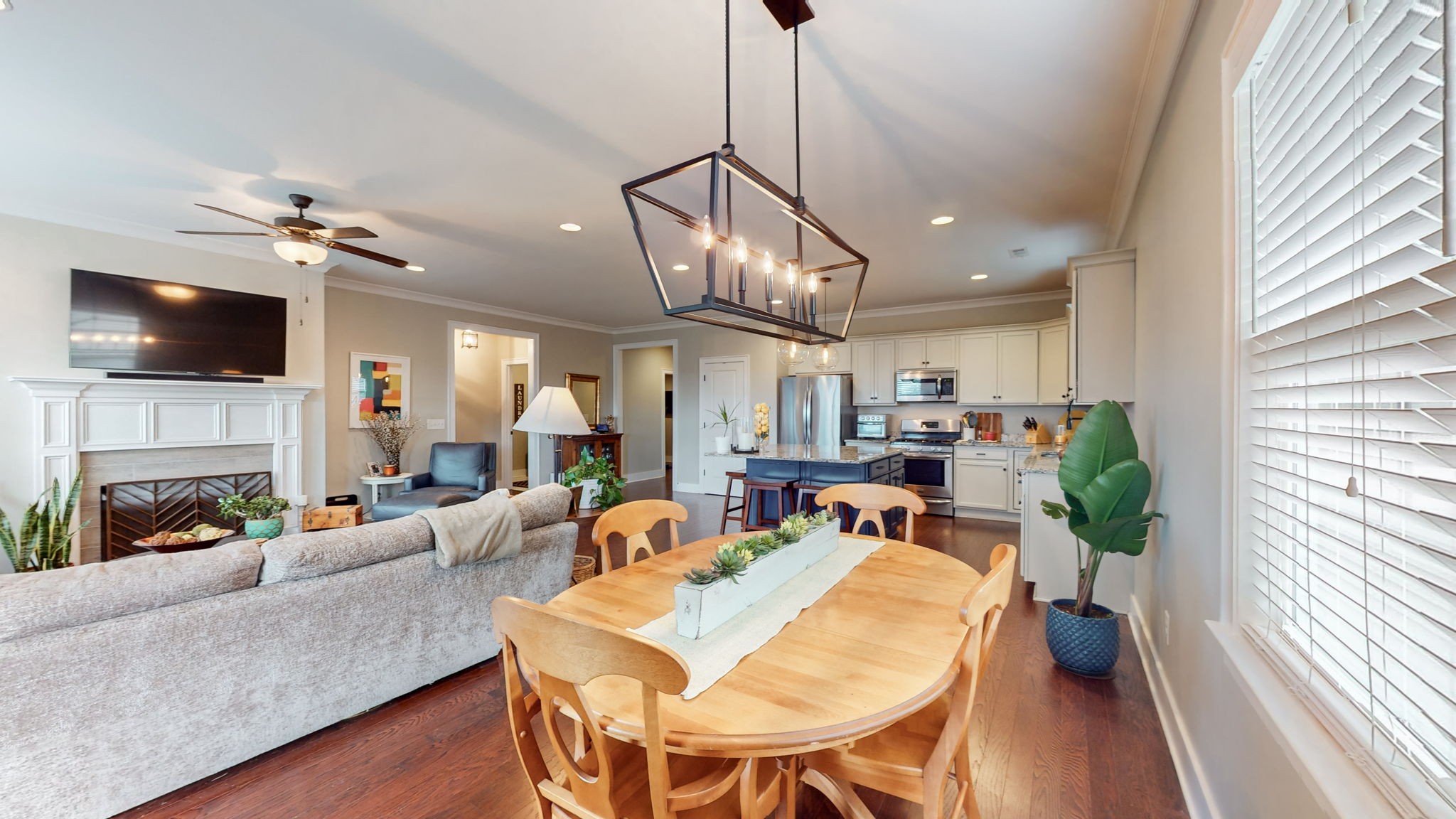 4031 Ryecroft Lane Franklin, TN 37064 - Photo 18 of 51 a living room with furniture a fireplace and a flat screen tv