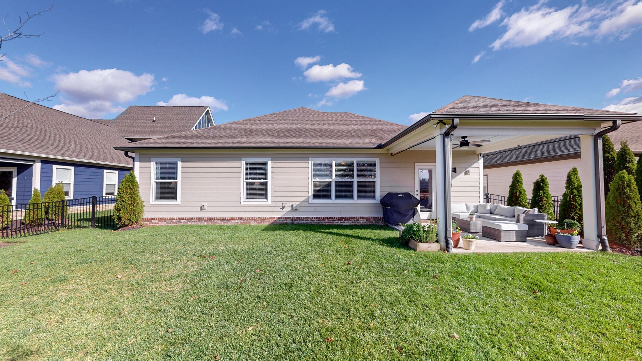 4031 Ryecroft Lane Franklin, TN 37064 - Photo 2 of 51 a view of a house with a backyard porch and sitting area