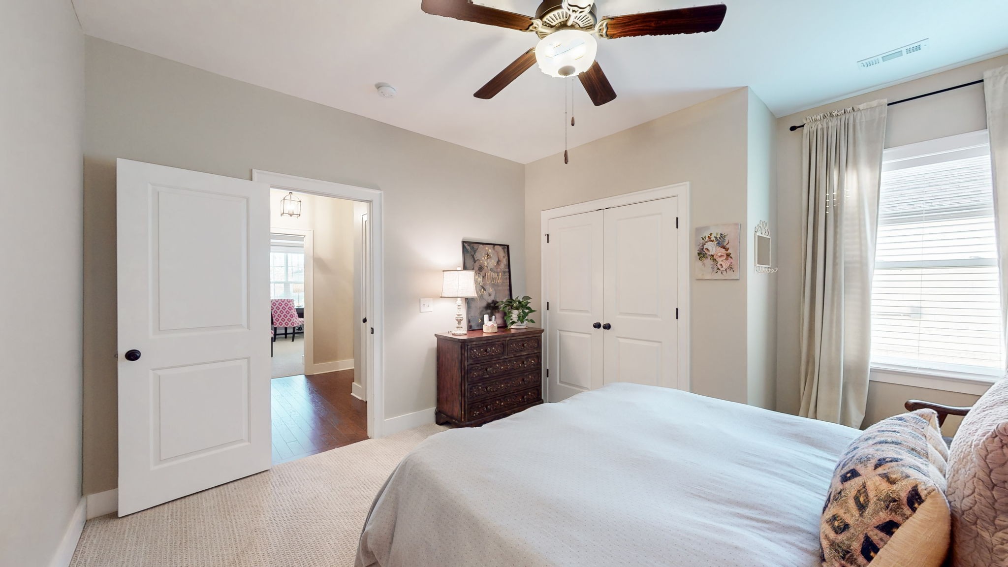 4031 Ryecroft Lane Franklin, TN 37064 - Photo 29 of 51 a bedroom with a bed and a chandelier