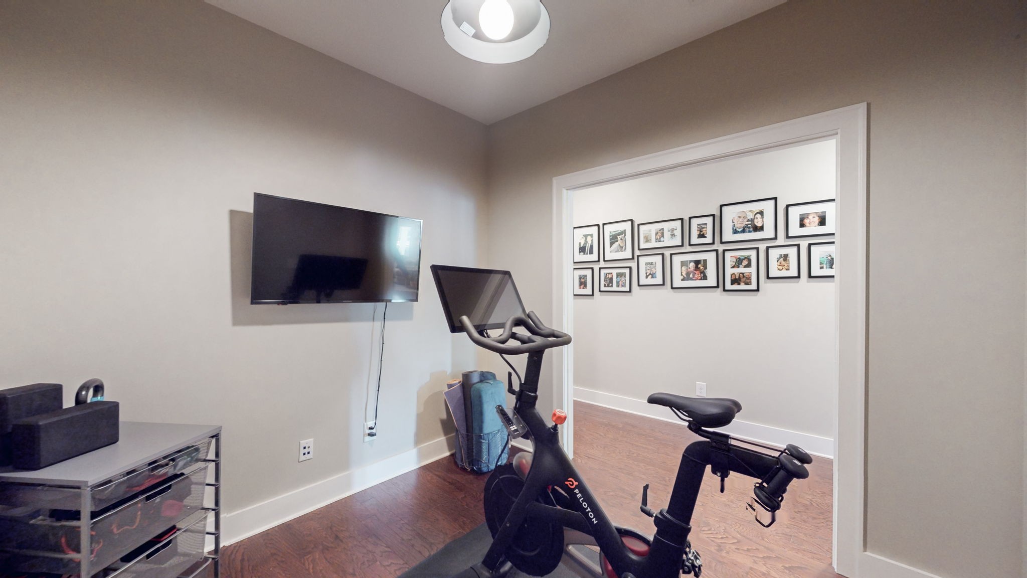 4031 Ryecroft Lane Franklin, TN 37064 - Photo 8 of 51 a view of a workspace with furniture and a flat screen tv