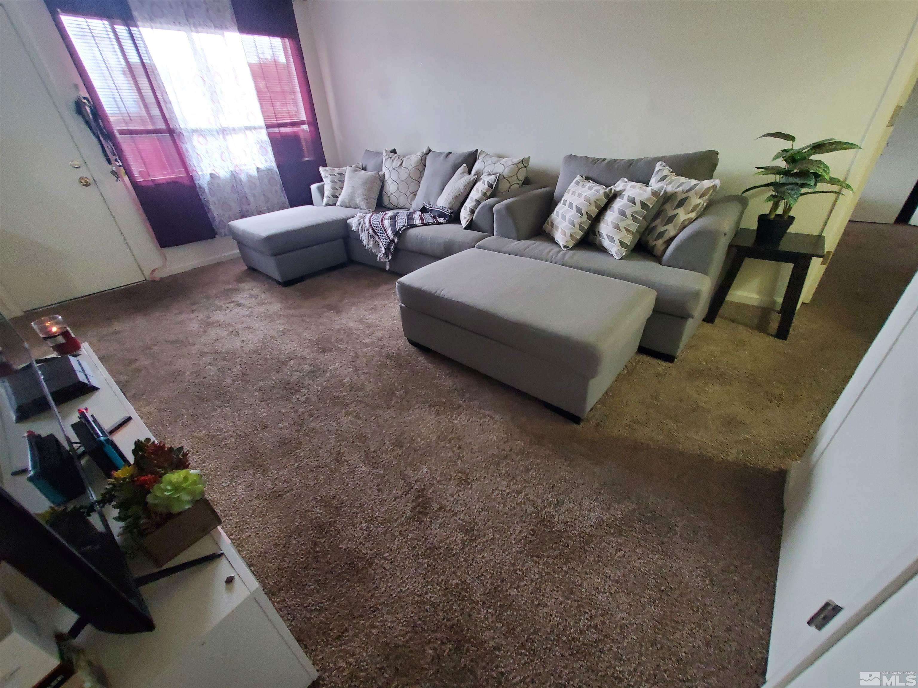 3575 Gypsum Road Reno, NV 89503 - Photo 11 of 32 a living room with furniture and a window