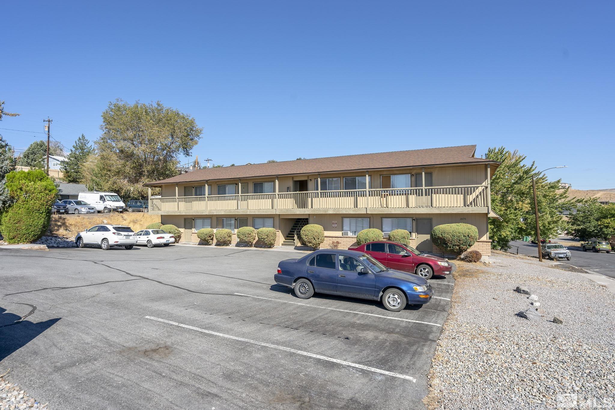 3575 Gypsum Road Reno, NV 89503 - Photo 2 of 32 a car parked in front of a building