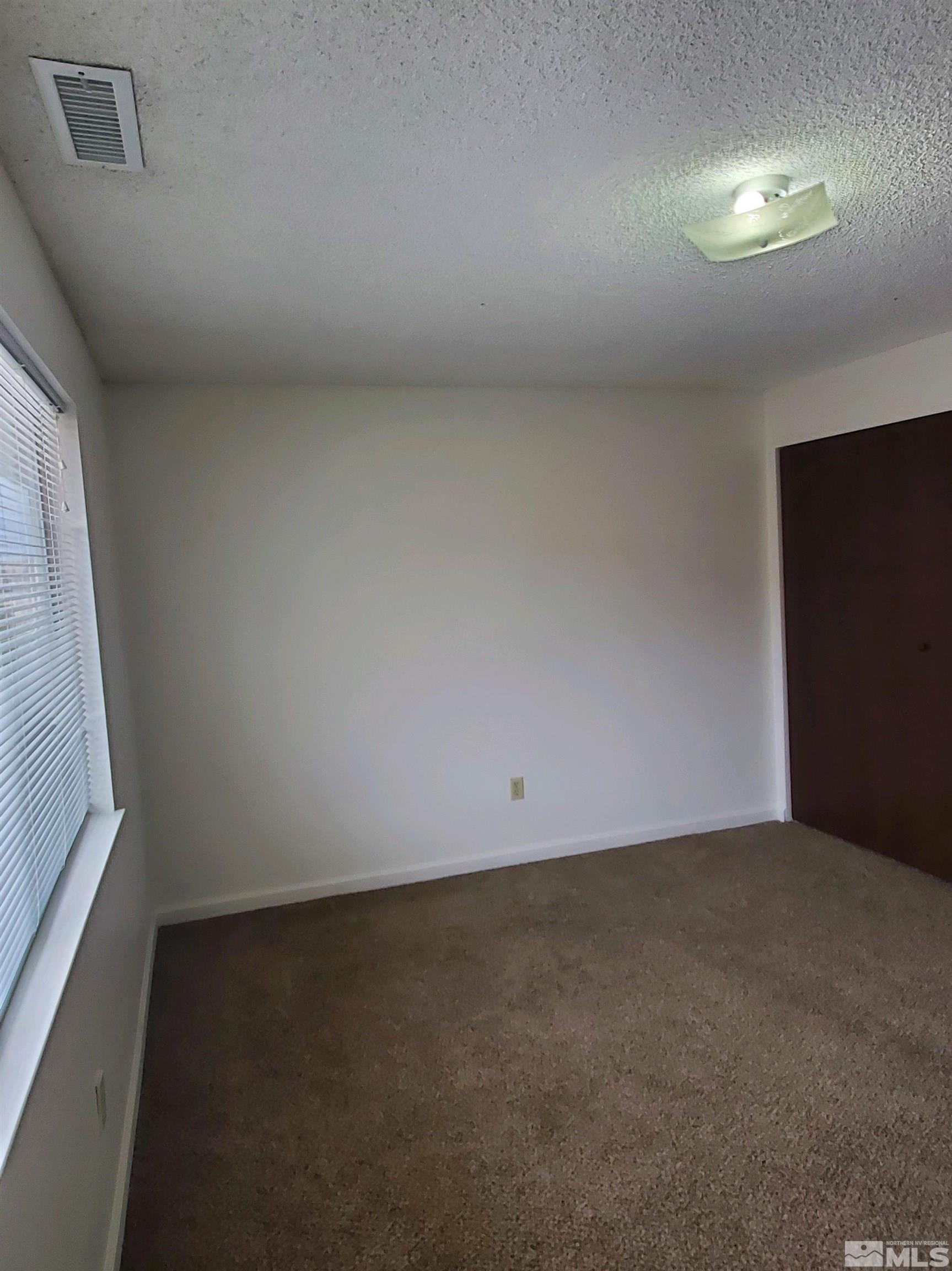 3575 Gypsum Road Reno, NV 89503 - Photo 24 of 32 an empty room with a window