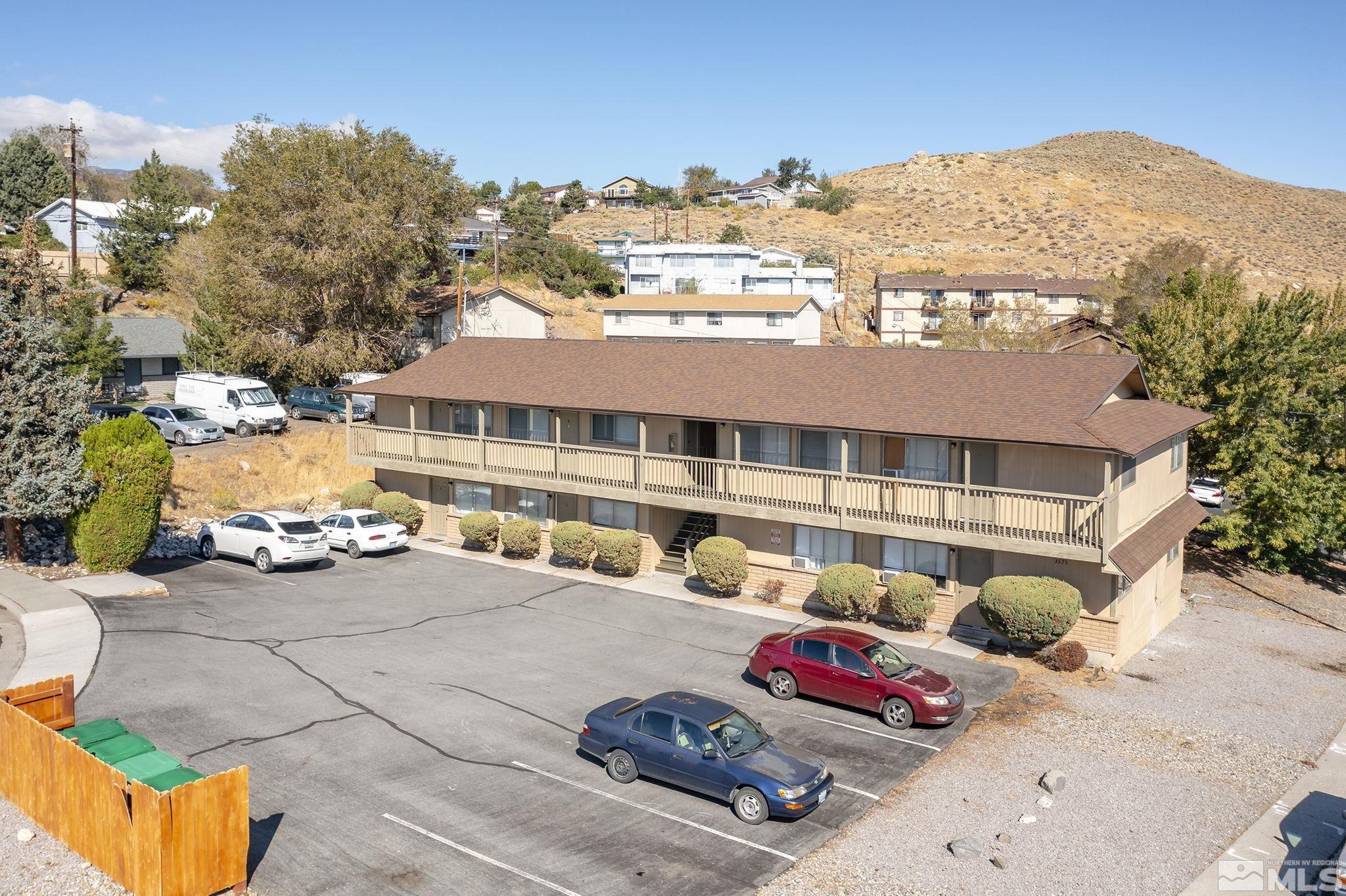 3575 Gypsum Road Reno, NV 89503 - Photo 3 of 32 a front view of a building with parking space