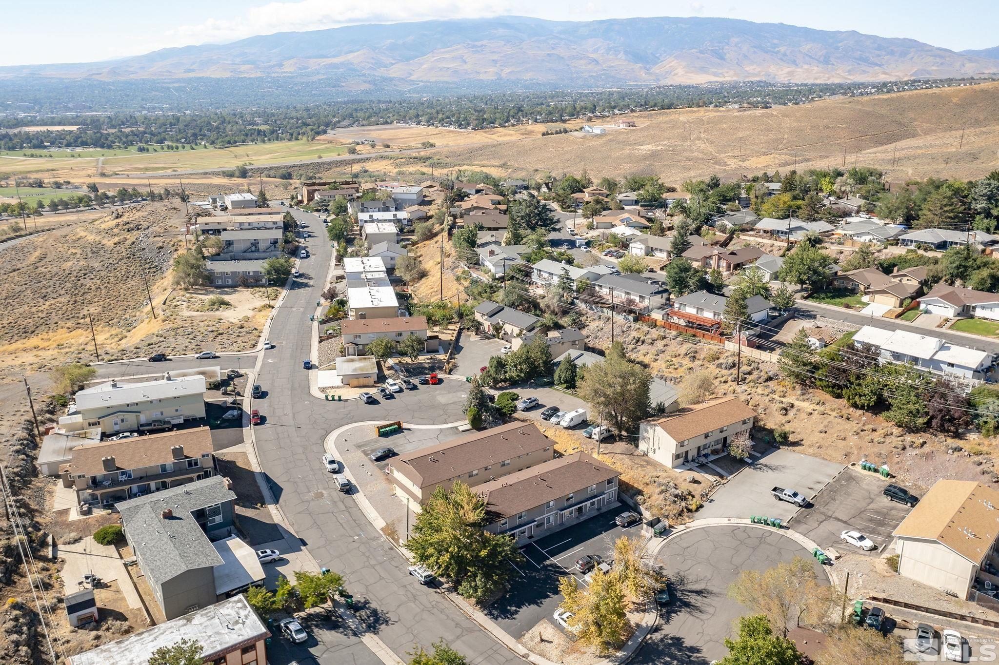 3575 Gypsum Road Reno, NV 89503 - Photo 4 of 32 an aerial view of a city and lake view