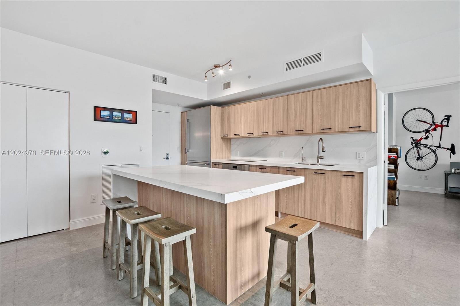 90 Southwest 3rd Street, Unit 3810 Miami, FL 33130 - Photo 19 of 45 a kitchen with a stove a refrigerator and a refrigerator
