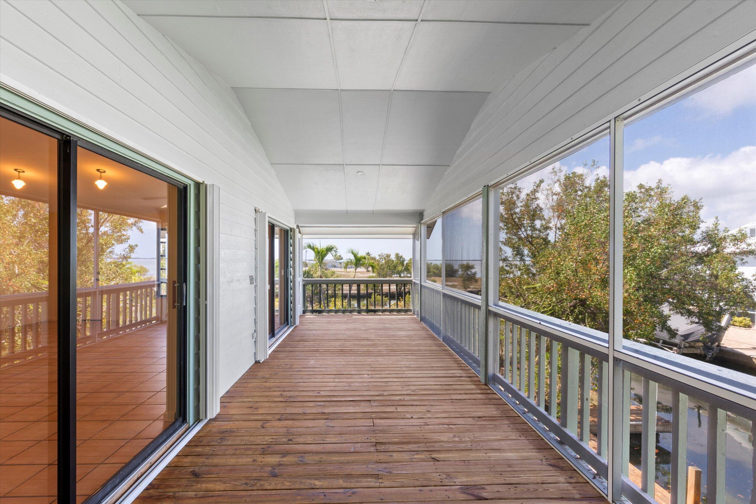 3714 Pine Street Big Pine Key, FL 33043 - Photo 15 of 64 a view of a balcony with wooden floor