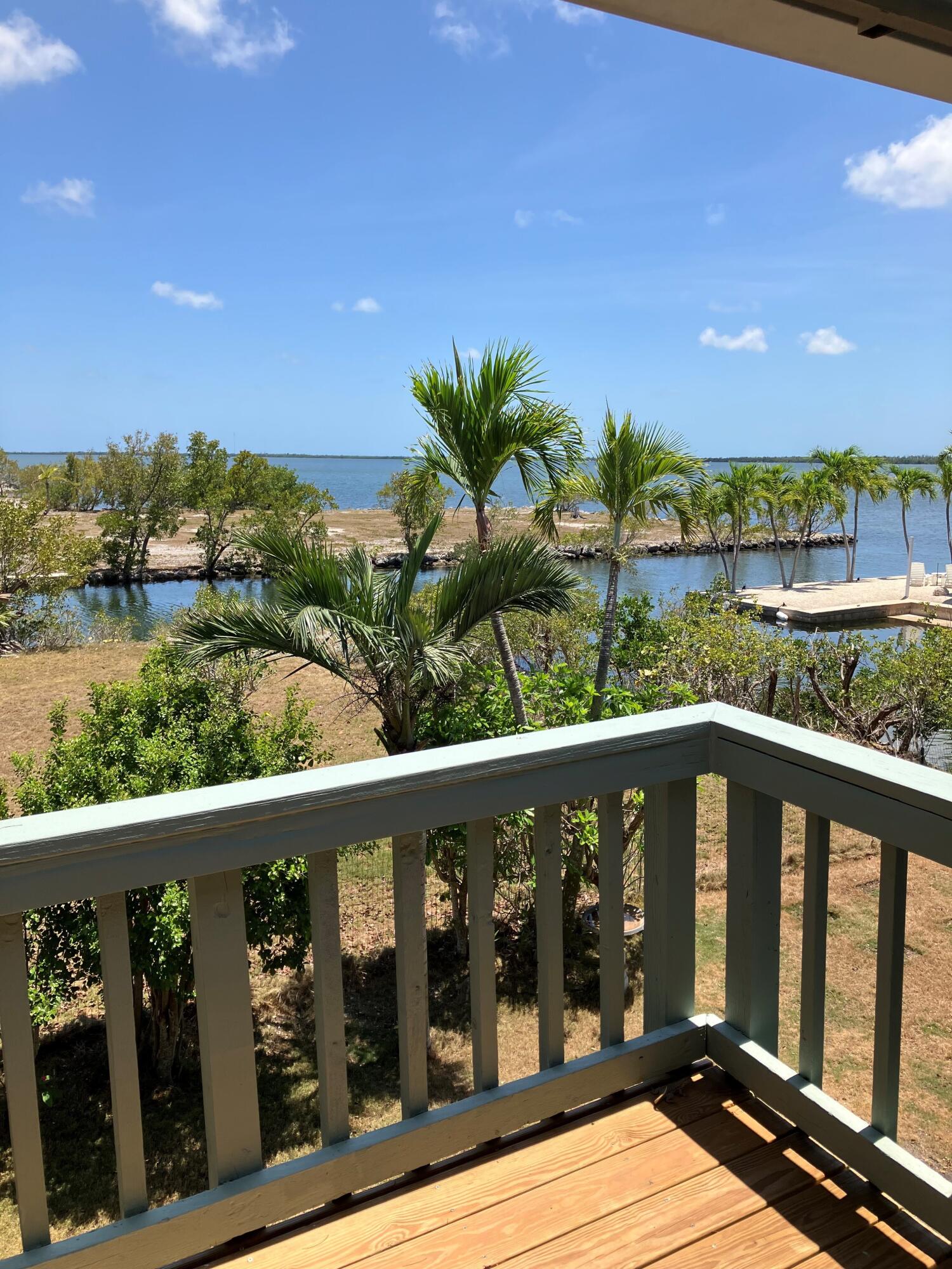 3714 Pine Street Big Pine Key, FL 33043 - Photo 19 of 64 a view of a balcony with wooden floor