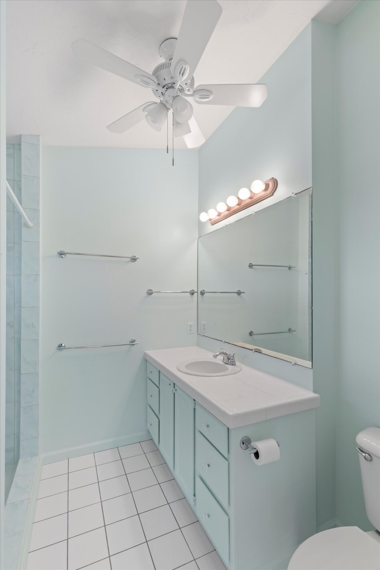 3714 Pine Street Big Pine Key, FL 33043 - Photo 25 of 64 a bathroom with a sink a vanity and a mirror