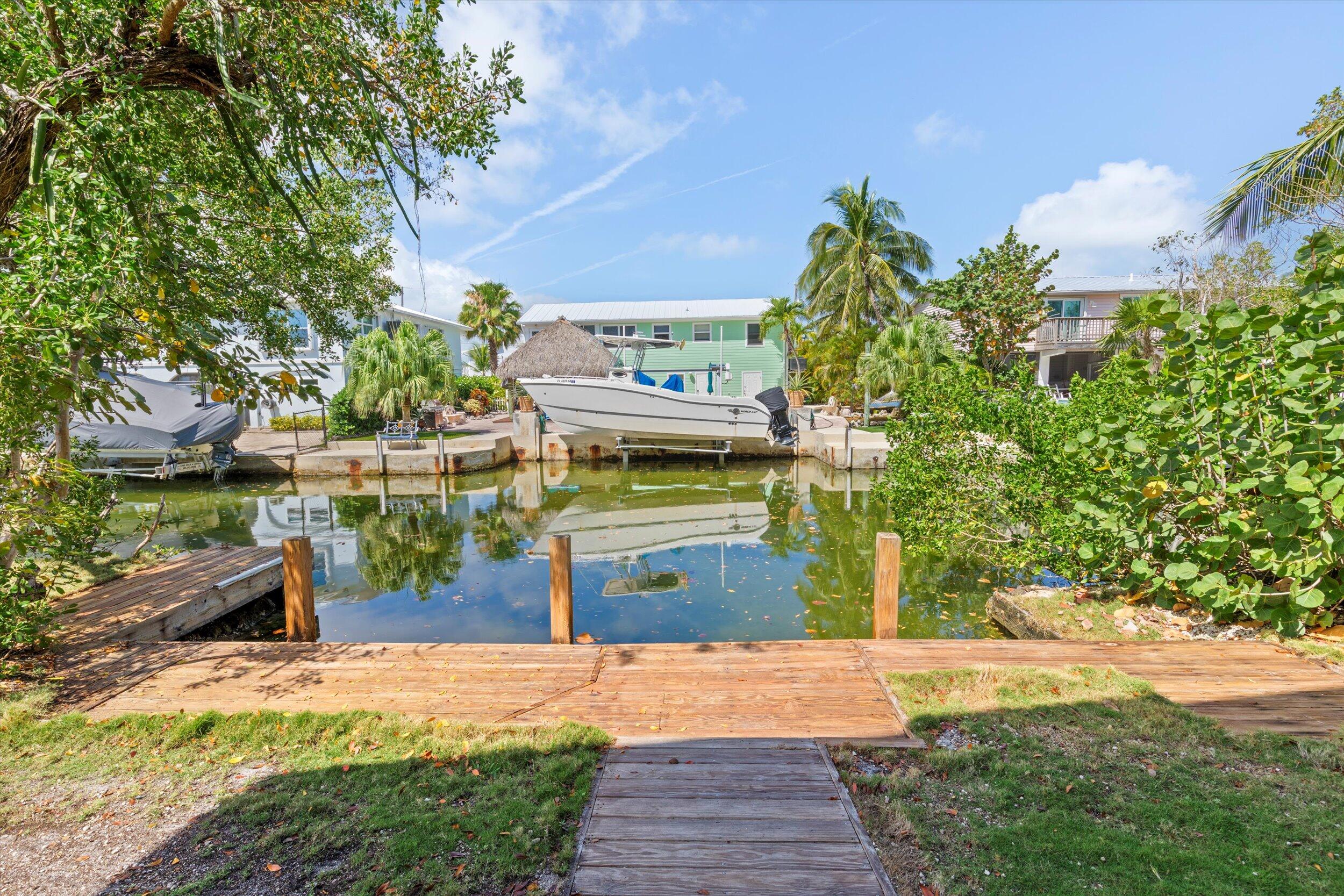 3714 Pine Street Big Pine Key, FL 33043 - Photo 39 of 64 a front view of a house with a yard