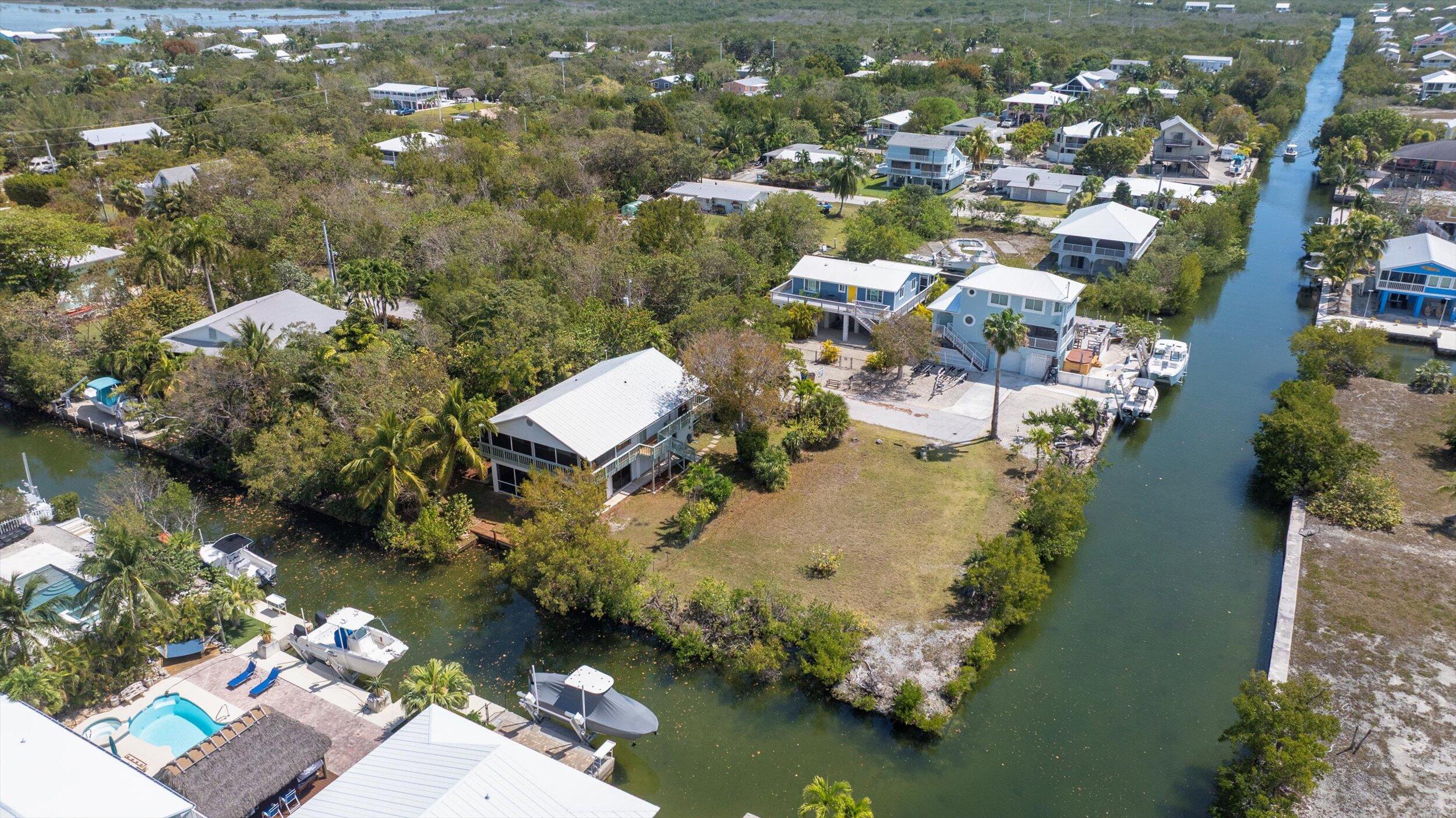 3714 Pine Street Big Pine Key, FL 33043 - Photo 50 of 64 an aerial view of lake and residential houses with outdoor space