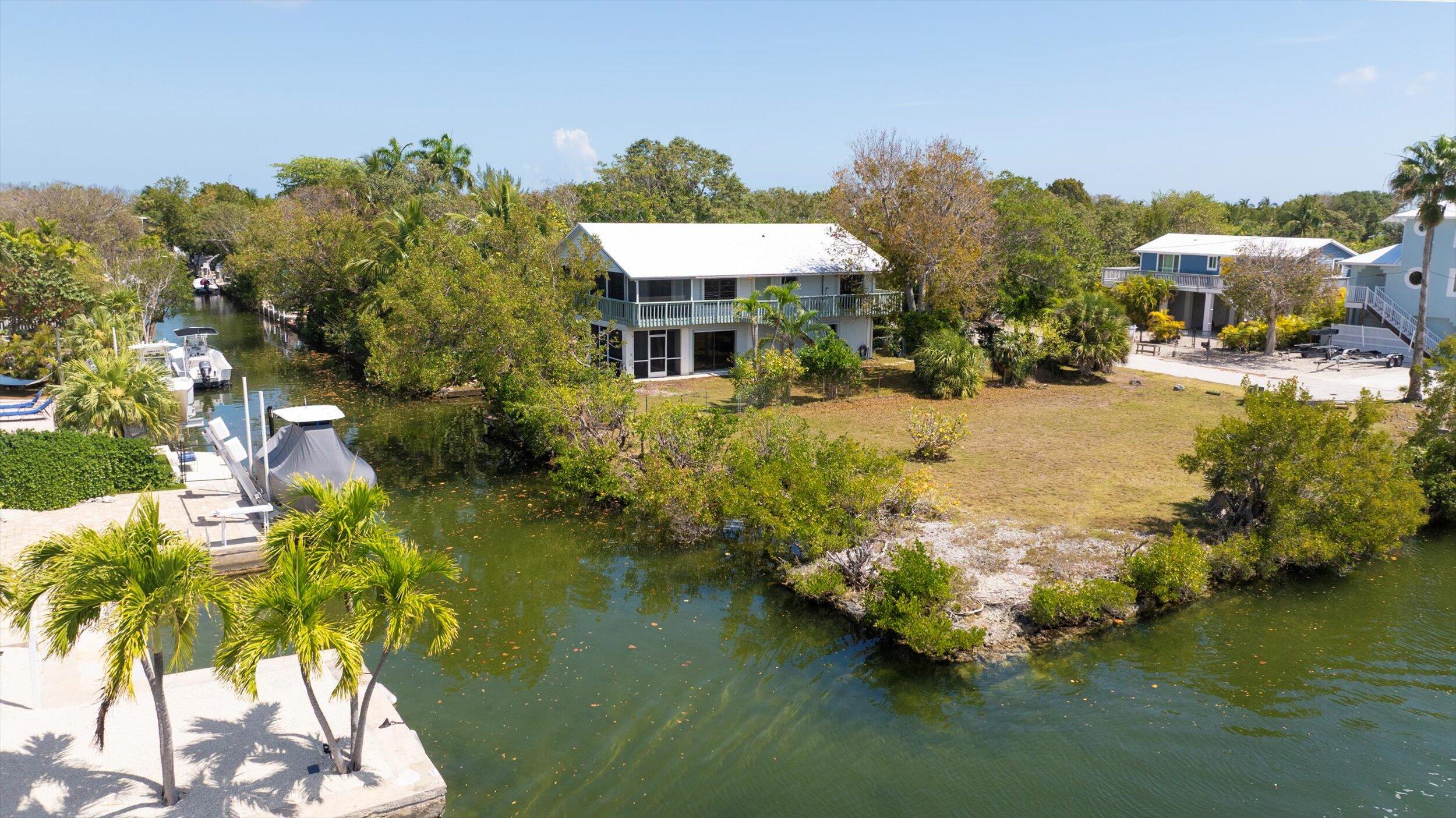 3714 Pine Street Big Pine Key, FL 33043 - Photo 58 of 64 a swimming pool with outdoor seating and yard