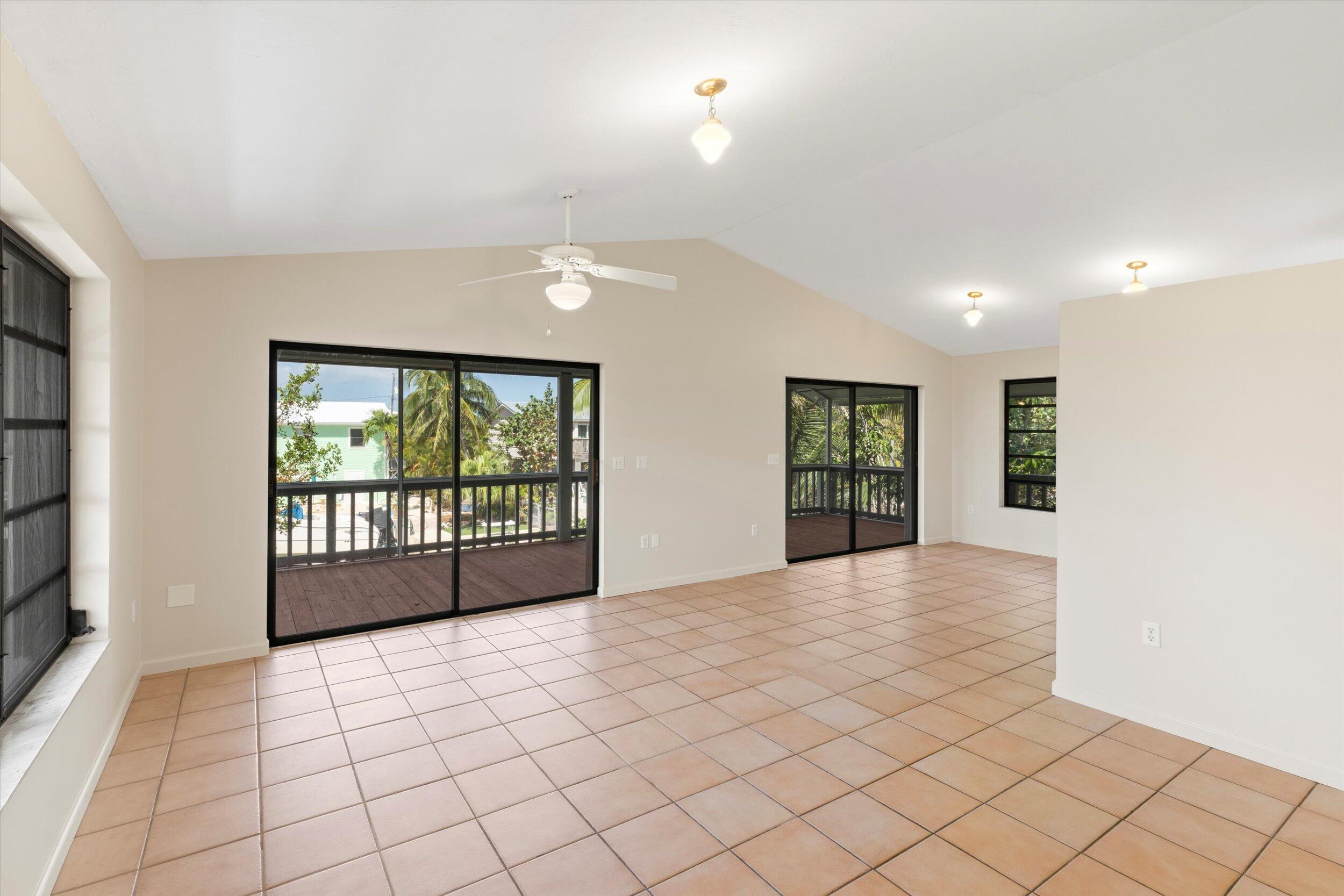 3714 Pine Street Big Pine Key, FL 33043 - Photo 6 of 64 a view of an empty room with window and cabinet