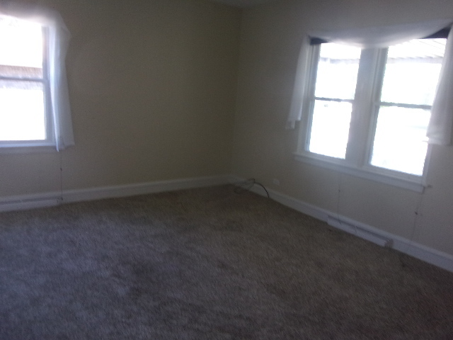 2918 Ridge Road Lansing, IL 60438 - Photo 5 of 7 an empty room with a window