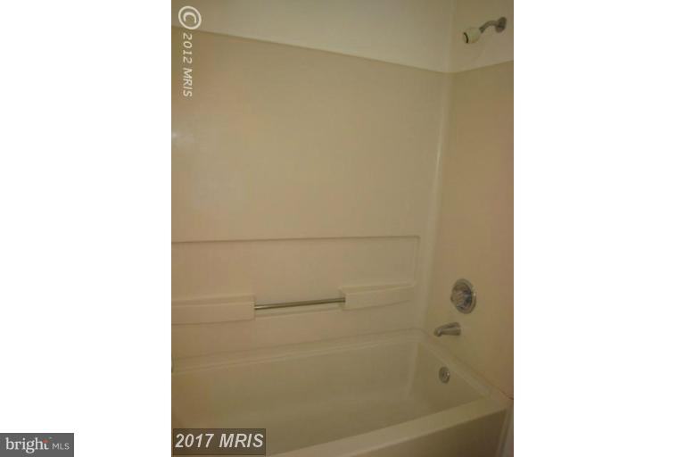 8335 Montgomery Run Road, Unit H Ellicott City, MD 21043 - Photo 15 of 22 a picture of a bathroom with a shower