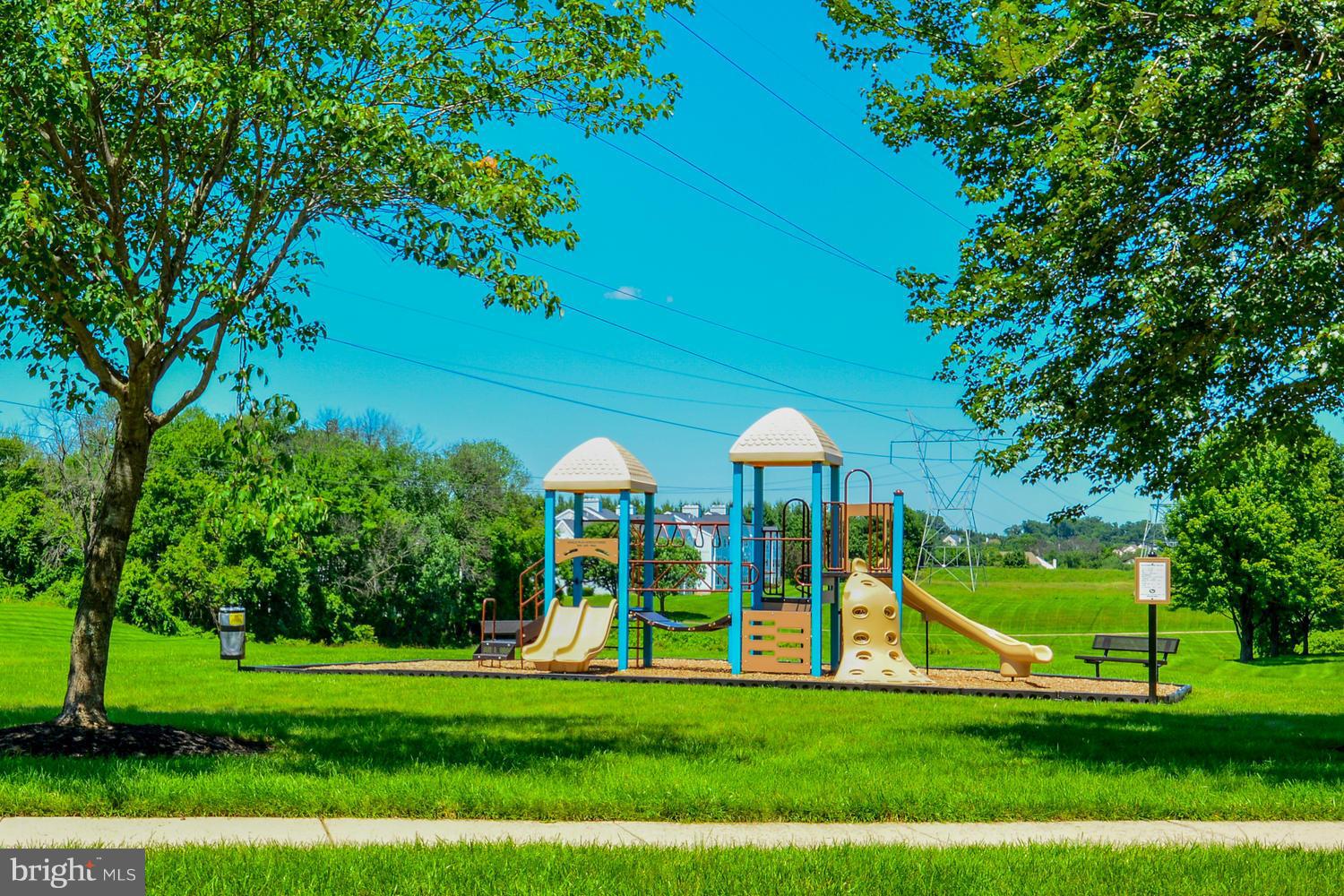 8335 Montgomery Run Road, Unit H Ellicott City, MD 21043 - Photo 20 of 22 a view of a park with large trees
