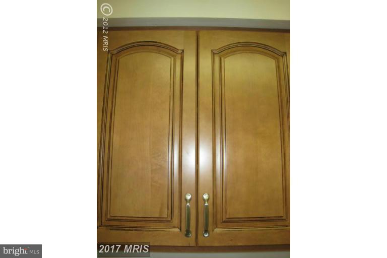 8335 Montgomery Run Road, Unit H Ellicott City, MD 21043 - Photo 21 of 22 a view of a entryway door