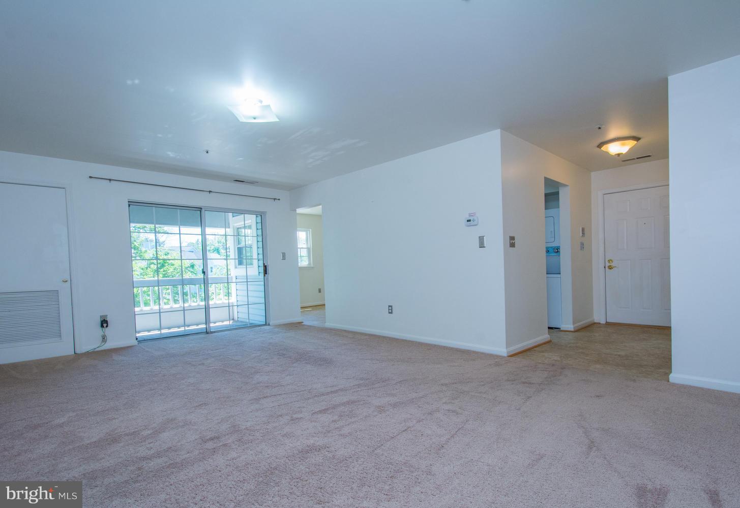 8335 Montgomery Run Road, Unit H Ellicott City, MD 21043 - Photo 8 of 22 a view of an empty room with a window