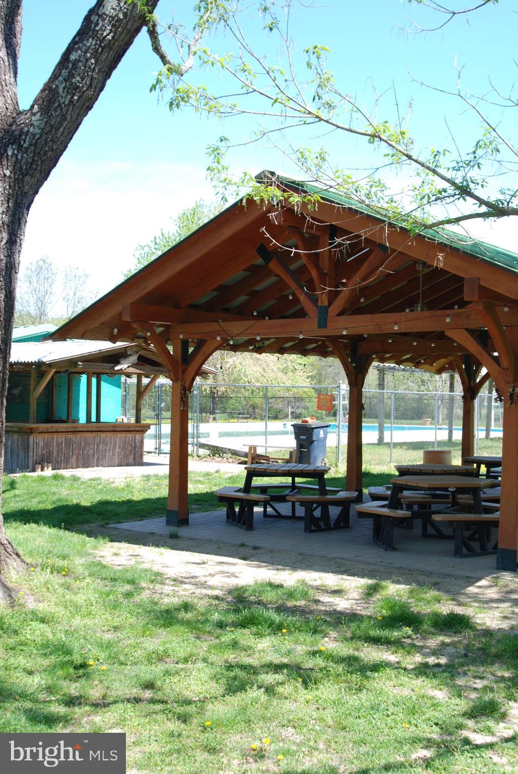 45 Bryan Point Road Accokeek, MD 20607 - Photo 8 of 21 a backyard of a house with barbeque oven