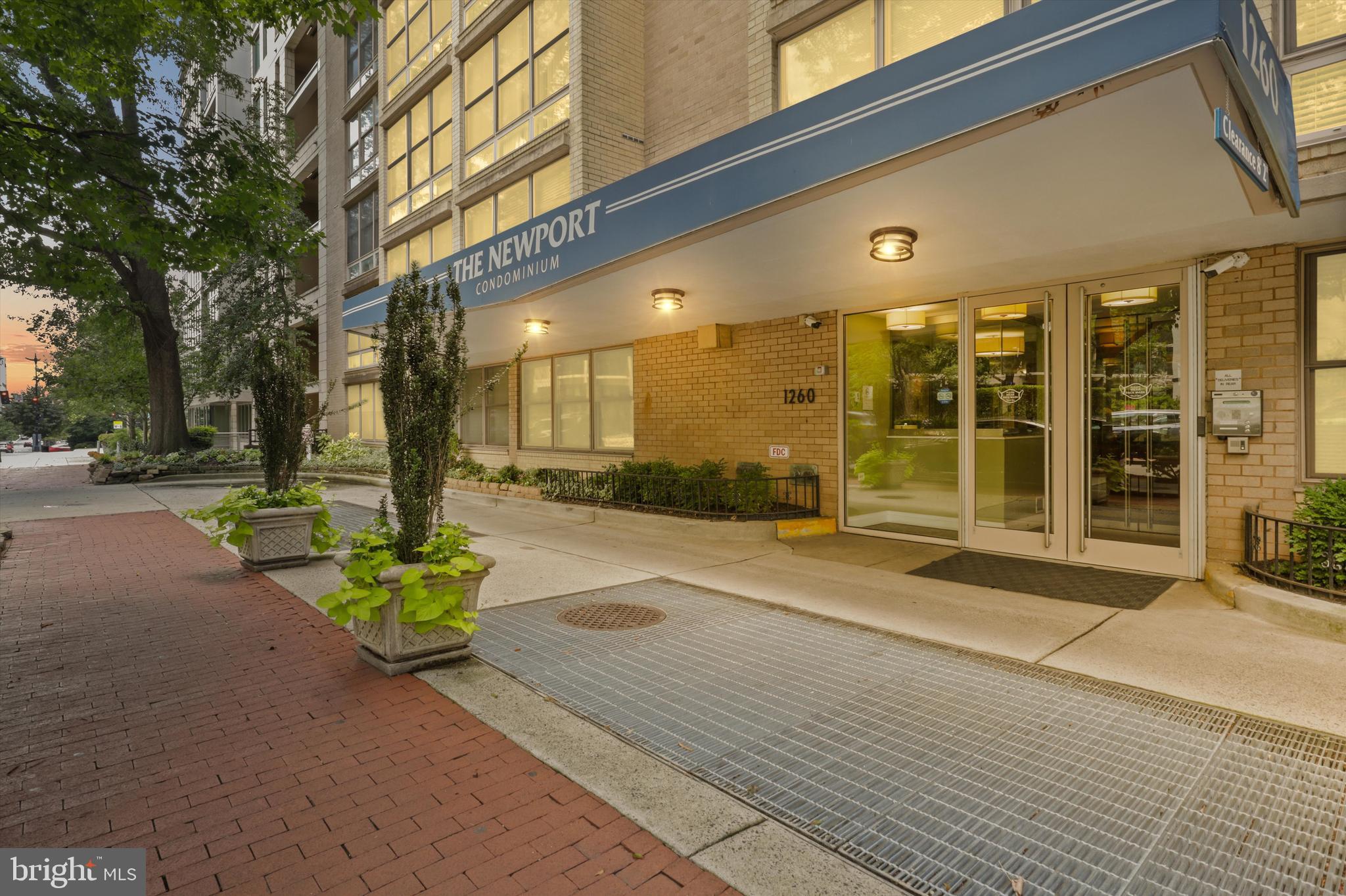 a view of a building with a park