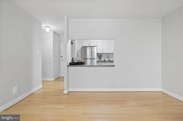 a view of kitchen with wooden floor